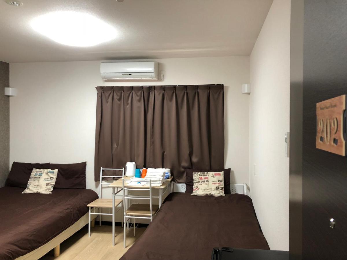אוסקה Keimei Guest House מראה חיצוני תמונה