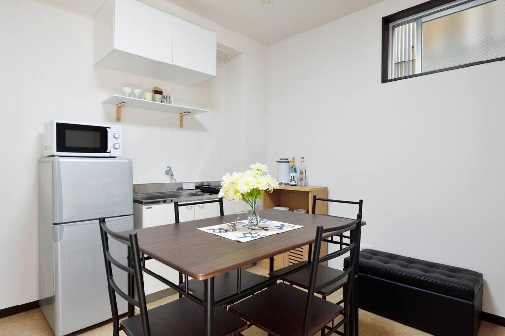 אוסקה Keimei Guest House מראה חיצוני תמונה