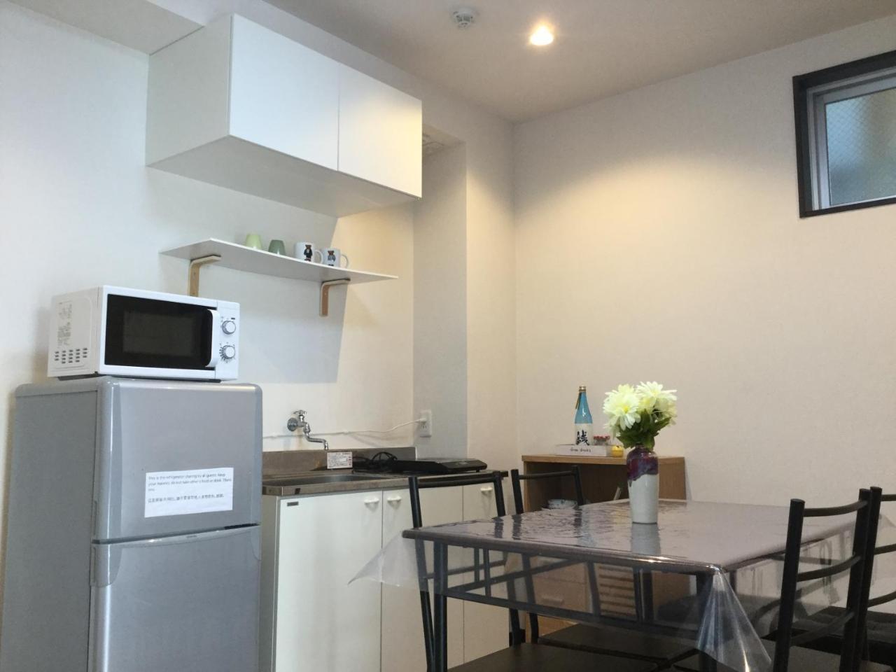 אוסקה Keimei Guest House מראה חיצוני תמונה